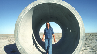 Nancy Holt inside Sun Tunnels, Utah, 1976, Photograph Ardele Lister Artwork (c) Holt Smithson Foundation and Dia Art Foundation.jpg